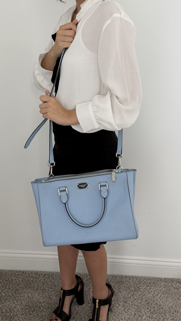 Beautiful Michael Kors structured satchel handbag in a soft powder-blue color.